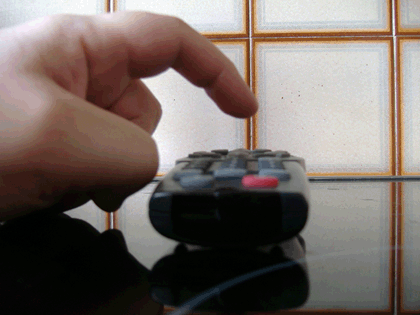 Animated gif of a remote control emitting IR light